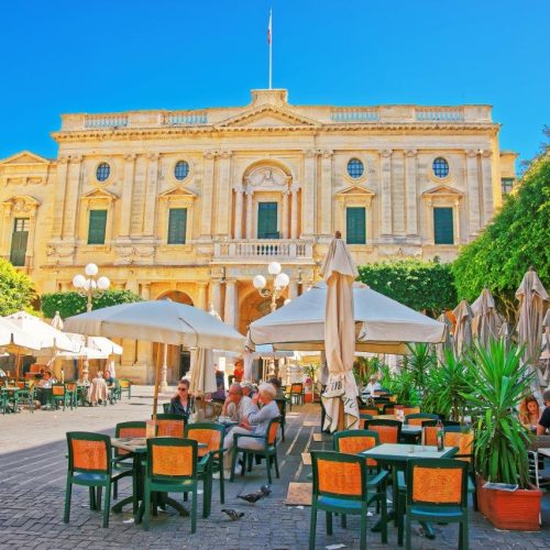 valletta-malta-april-1-2014-people-resting-open-air-cafes-republic-square-with-national-library-valletta-old-town-malta